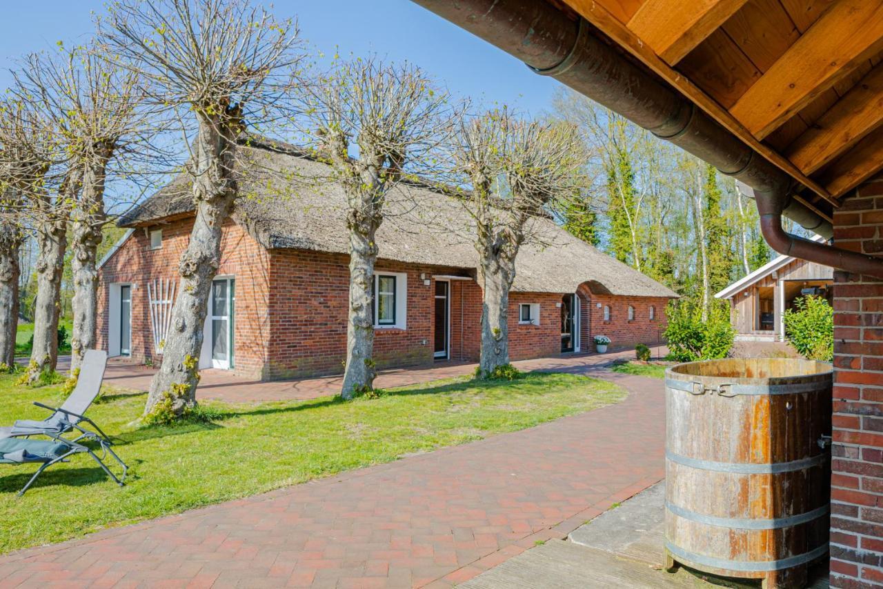 Villa Hübsches Reetdach-Ostfriesenhaus Südbrookmerland Exterior foto